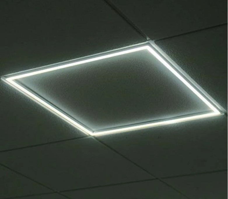 2x2 LED frame light being installed in drop ceiling, slim recessed panel LED lighting for office, school, and commercial ceiling lighting applications