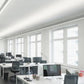 Commercial LED linear light fixture providing bright, efficient lighting in an office environment
