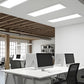 LED Back-Lit Panel Light PB2 Series installed in open office layout, providing adjustable color temperature and energy-efficient illumination