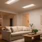 Cozy living room featuring LED Center Basket Troffer ceiling lighting with soft, comfortable, and evenly distributed illumination