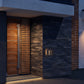 LED outdoor wall pack light installed on a residential house exterior
