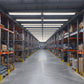 LED wraparound lights installed in a warehouse to illuminate work and storage areas.