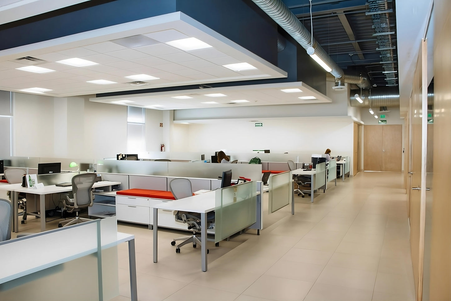 Modern office ceiling featuring LED surface mount backlit panel lights with elegant glare-free illumination and energy-efficient performance