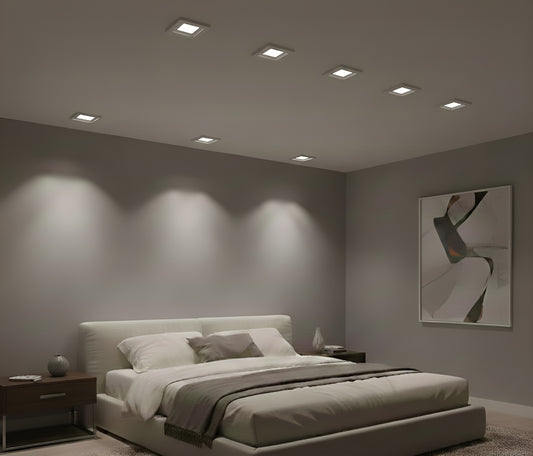 Square slim LED recessed downlight 5CCT IC-rated canless ceiling light installed in modern living room, CRI 90+, Energy Star certified.